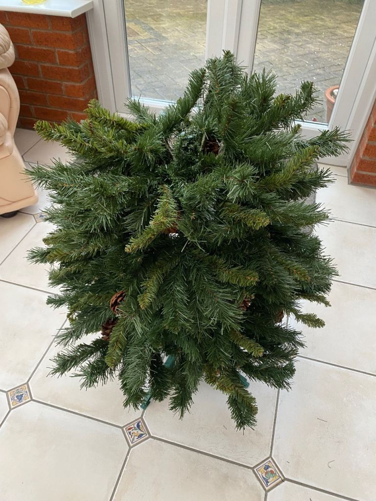 Lovely realistic artificial Christmas tree