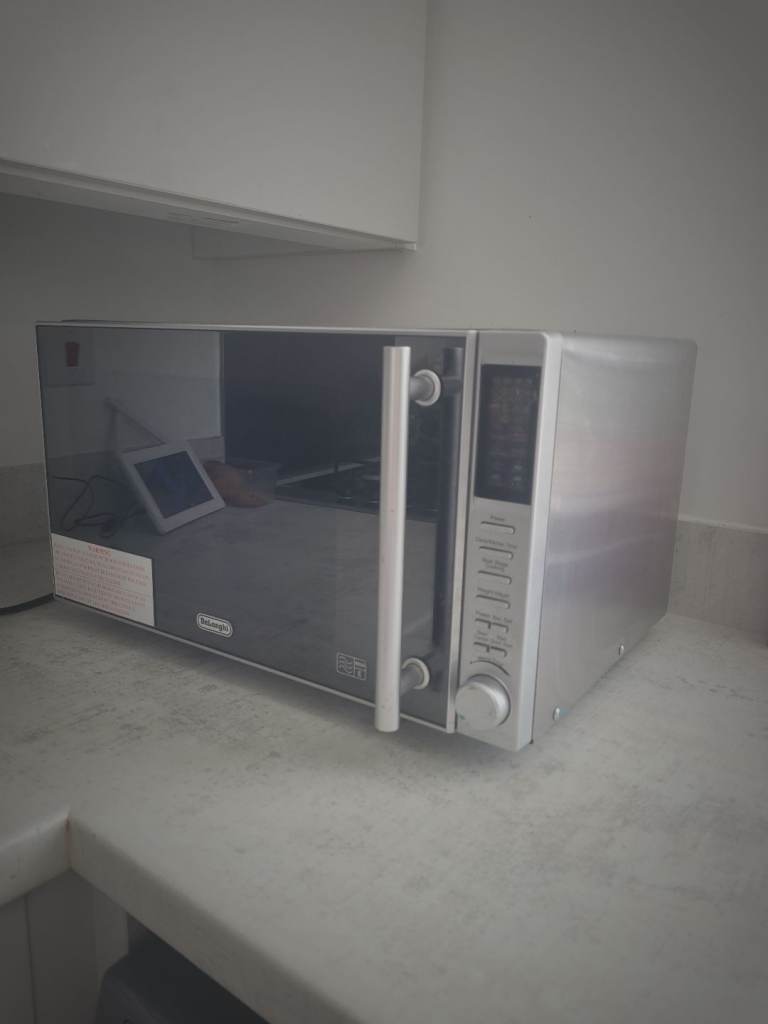 Microwave multifunctional Delonghi 