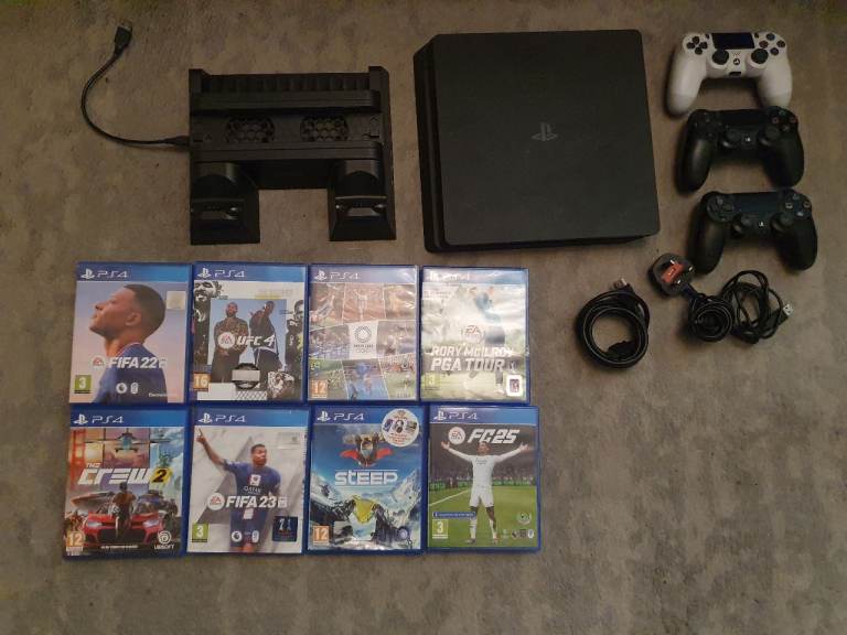 Sony PlayStation 4 Slim Console with 3 Controllers and 8 Games