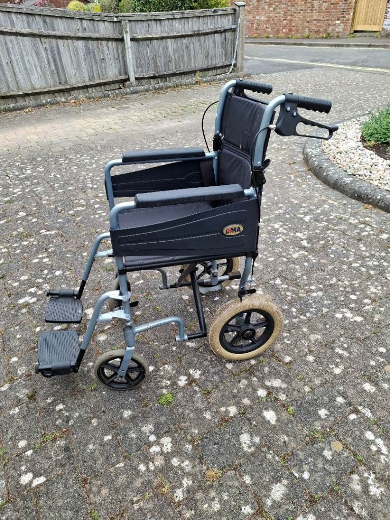 FREE folding wheelchair - needs two new rear tyres or wheels