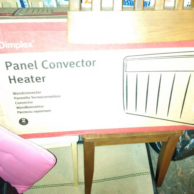 unused heavy duty 3kW wall mounted Dimplex convector panel heater with timer