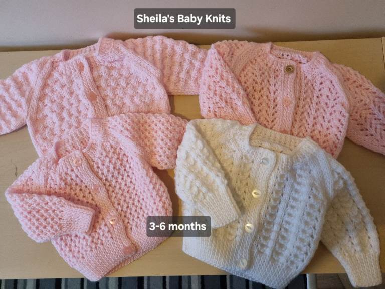 New hand knitted baby cardigans 