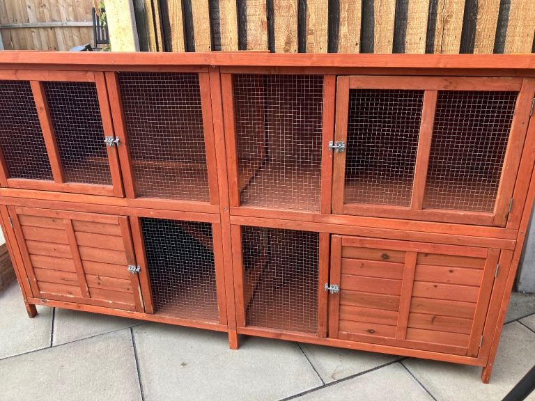 Two story wooden rabbit hutch