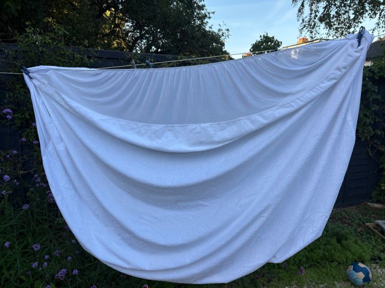 White Double Bed Waterproof mattress protector – Good Condition