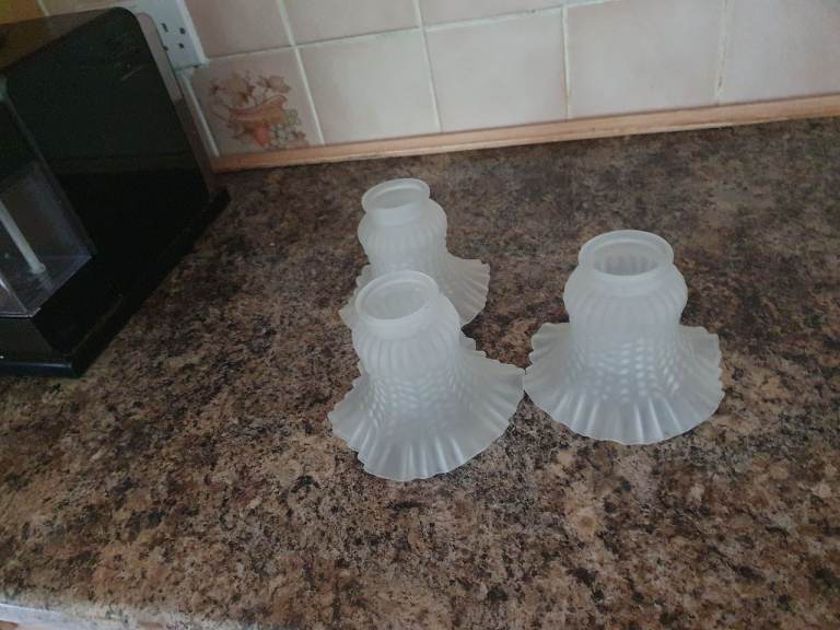 Three  glass light shades
