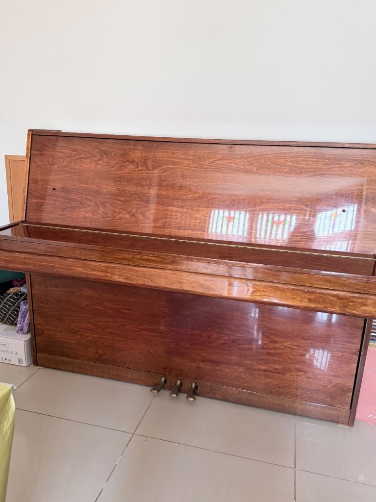Lovely Wooden Upright Piano – Good Condition