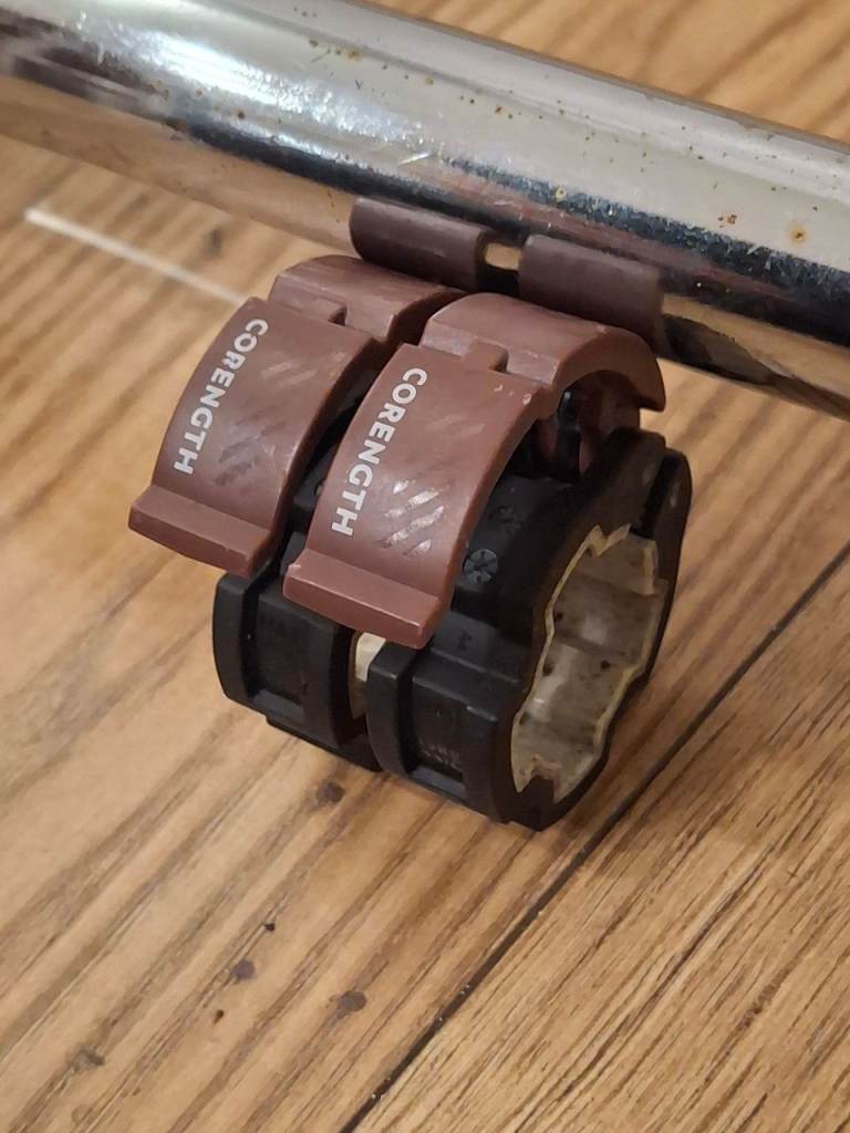 Curved barbell with cast iron weights