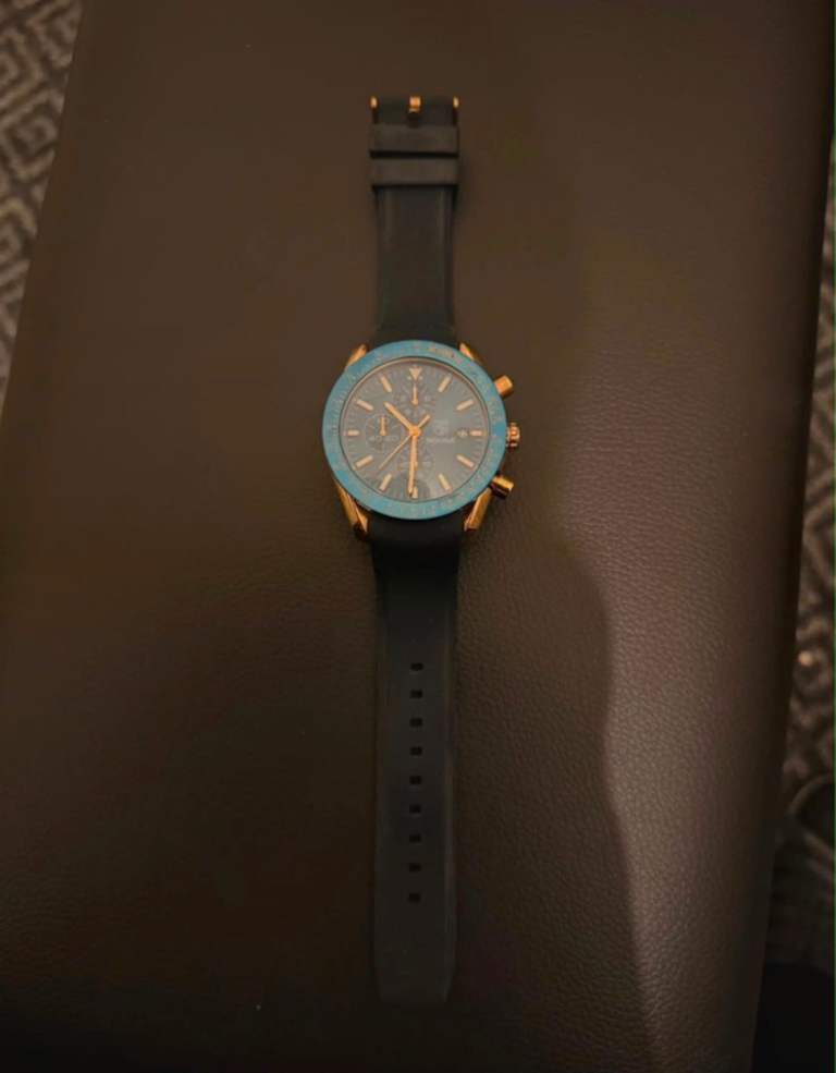 Stylish Blue and Gold Watch with Black Strap
