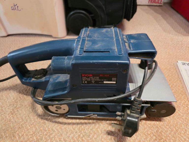 Ryobi BE-424 heavy-duty 4-inch belt sander.