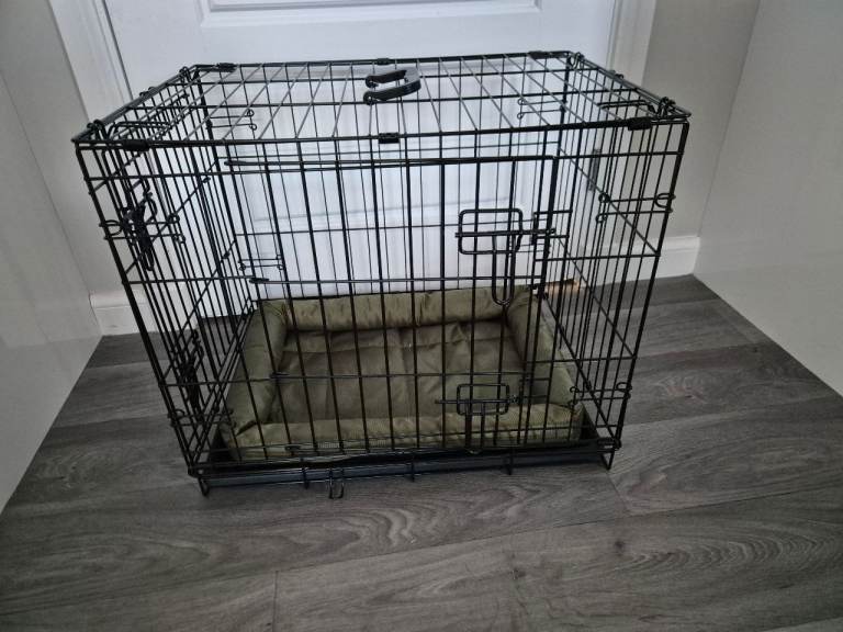 Small 24 inch dog crate and mat 