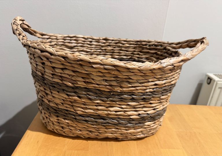 Brand new wicker storage basket with handles 
