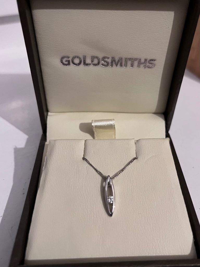 0.15 carat diamond/sterling silver necklace