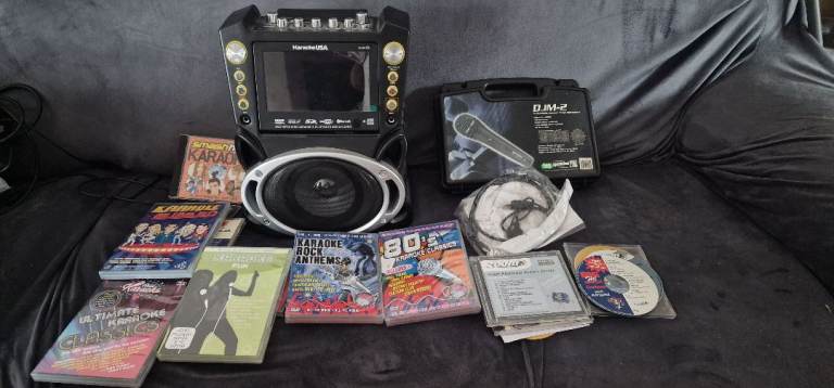 Karaoke USA System with Screen, Microphone, and Loads of CDs