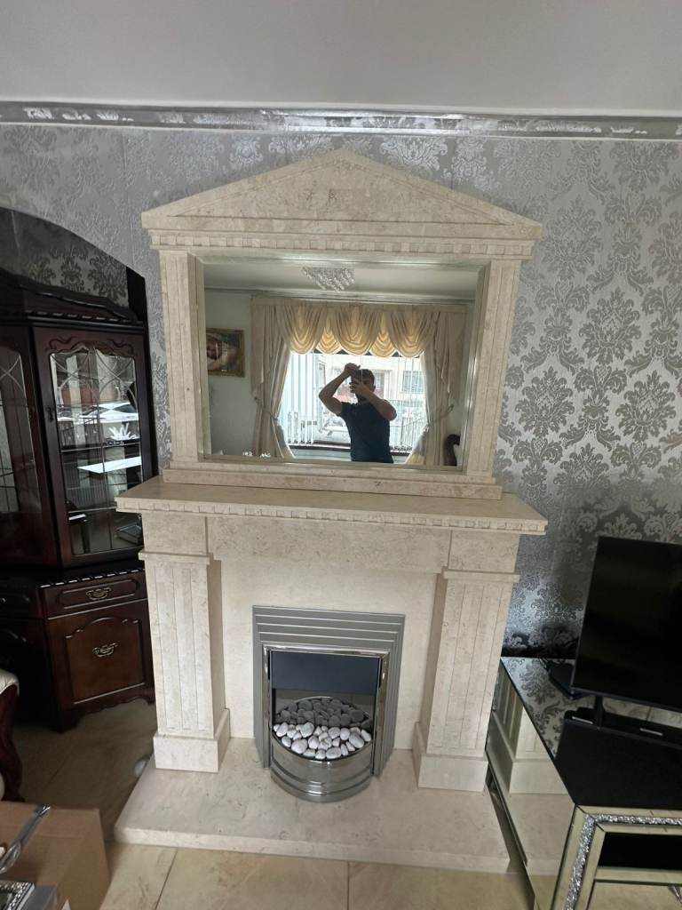 Really nice marble fireplace with electric fire insect with matching mirror £250