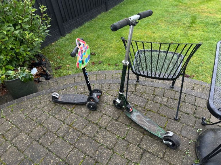 Child’s and adults push along scooters