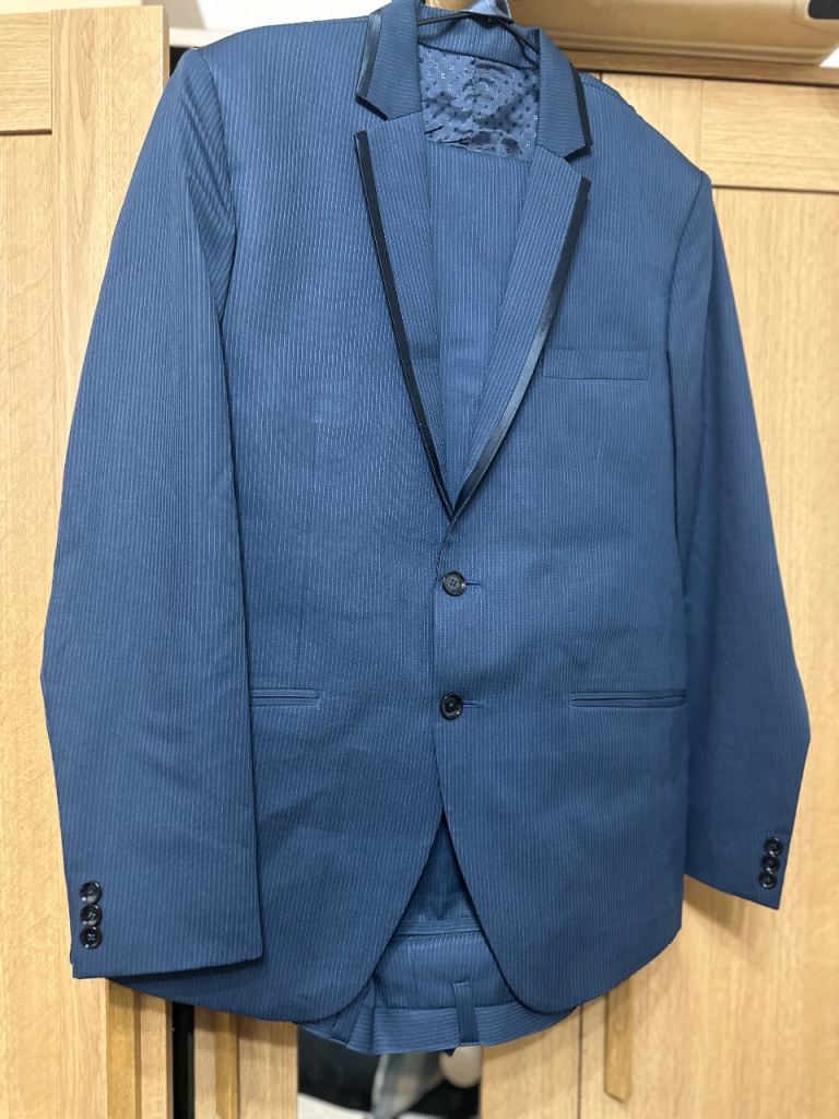 Tailored suits Raymond 