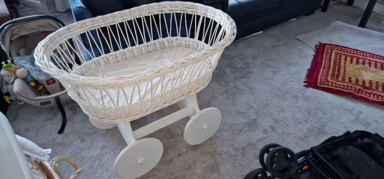 Moses basket wooden with wheels fair condition