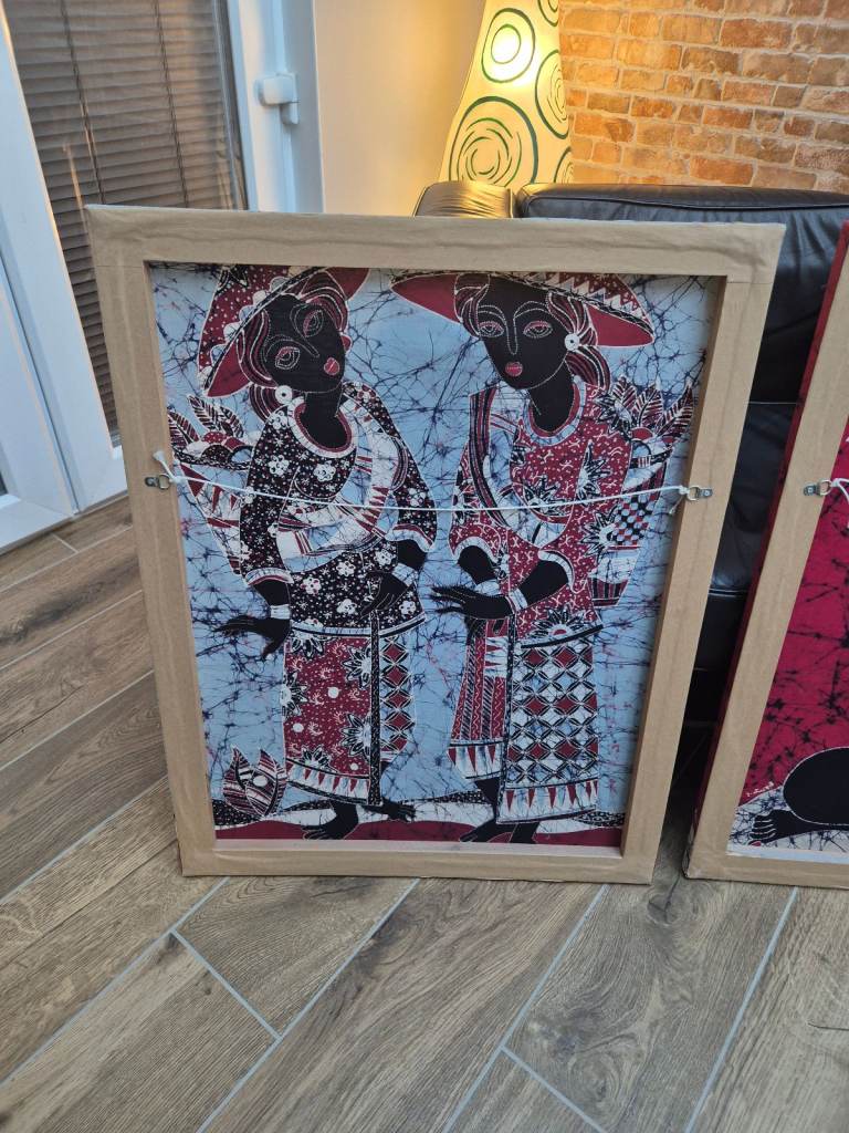 Four batik pictures on wooden frames