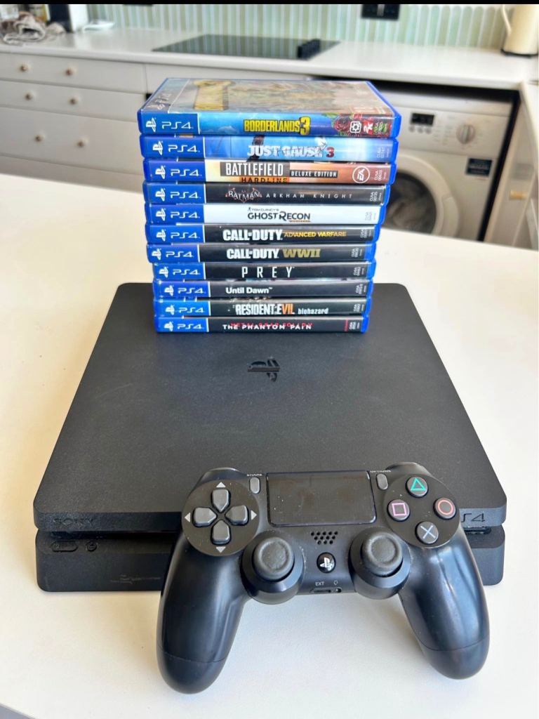 PS4 Console with Controller and 10 Games – Good Condition