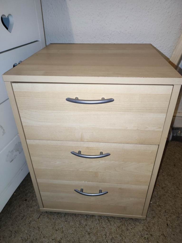 5 drawer chest,  3 drawer bedside and a book holder 