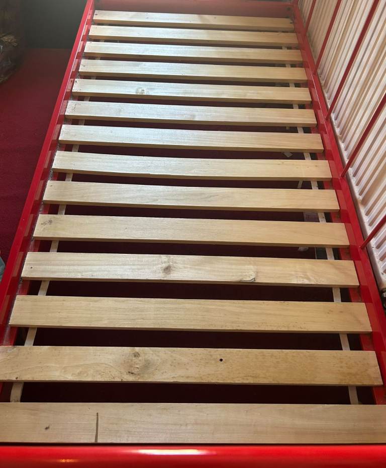 Red metal day bed