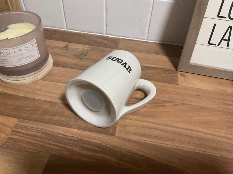 Vintage white sugar pourer