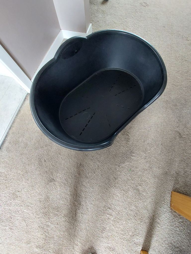 Large plastic dog bed