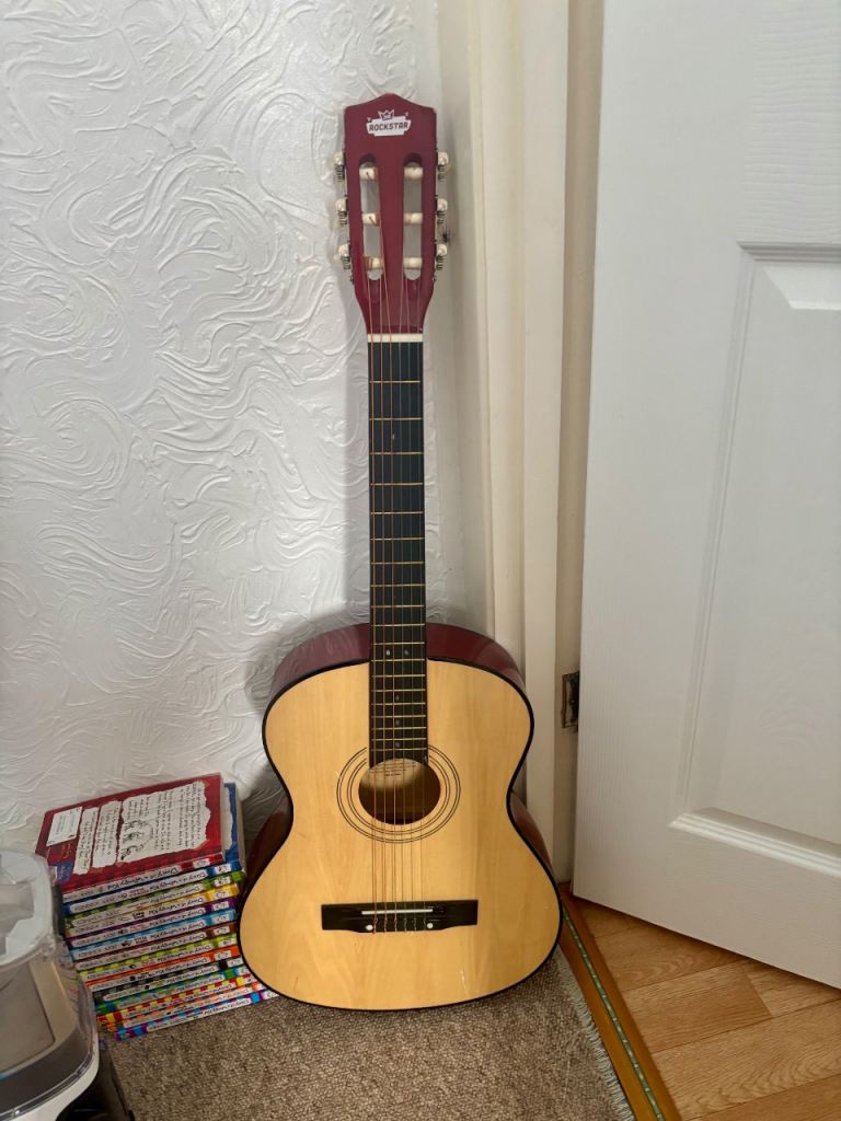 ROCKSTAR Acoustic Junior Guitar with how to books