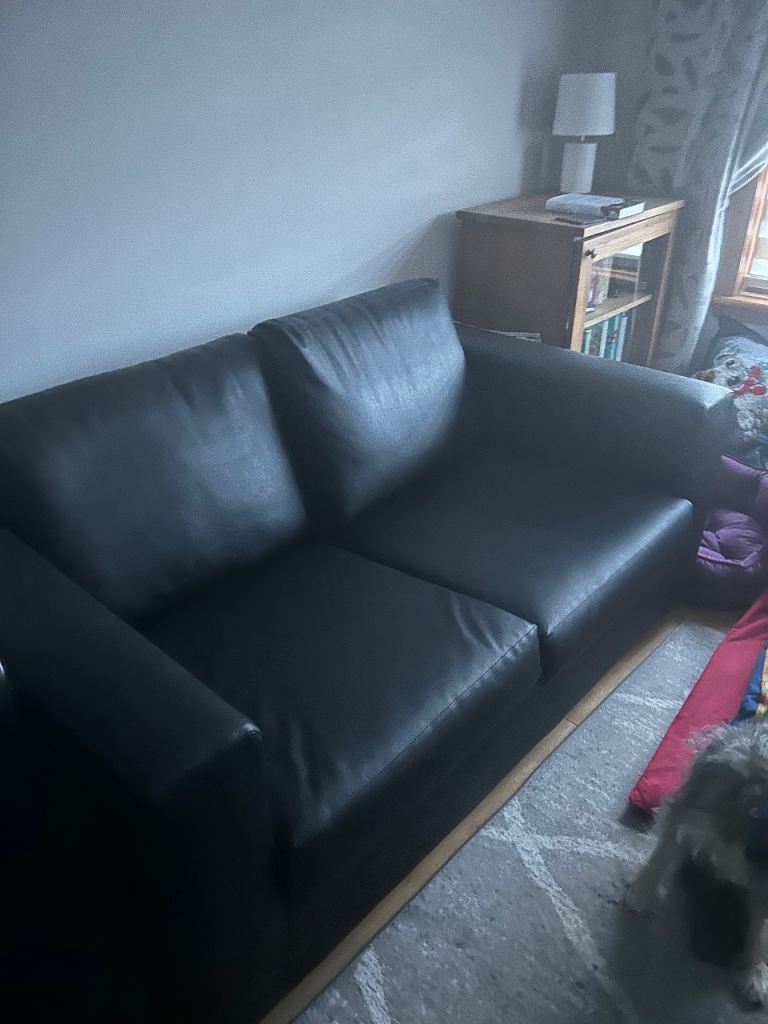 Black leather sofa bed in Good Condition