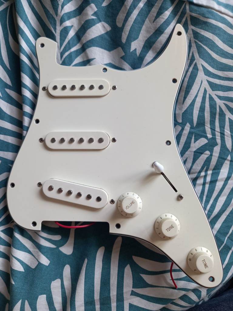 Vintage 1980s stratocaster loaded scratchplate in good condition