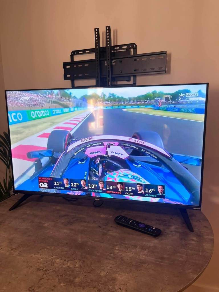 LG Smart TV with Remote – Good Condition, Wall Mount Included
