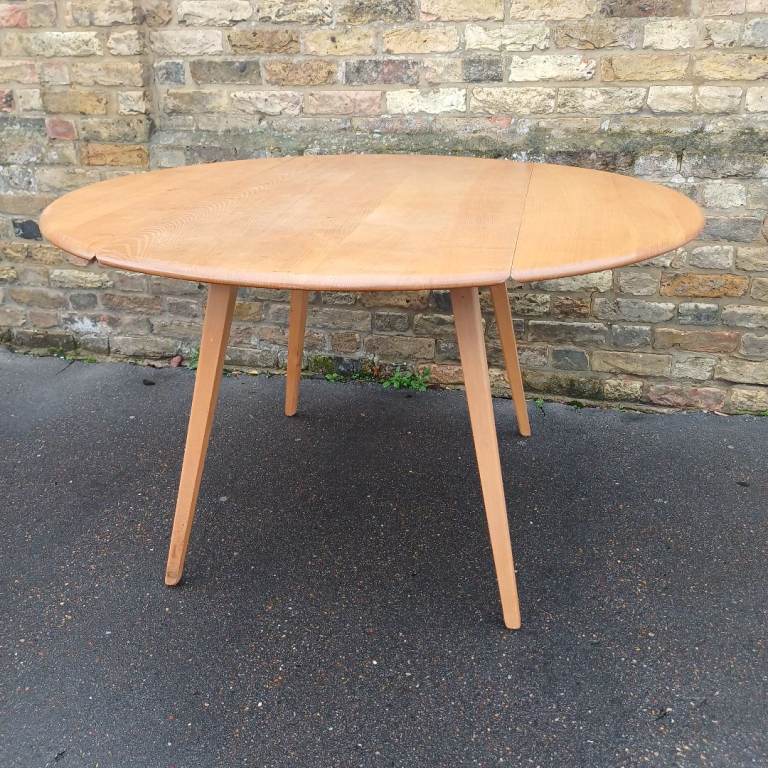 Vintage 1970s Ercol drop leaf round dining table