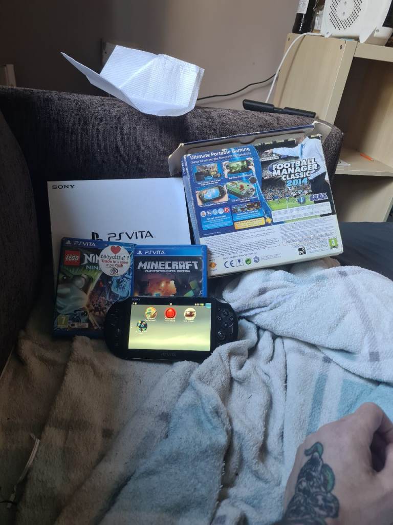 Ps vita 2003 model with 2 games 