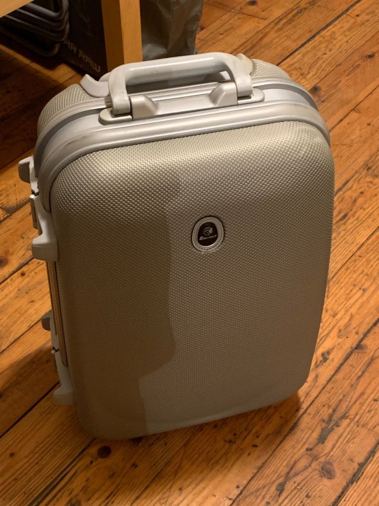 Silver suitcase URGENT until 26th March