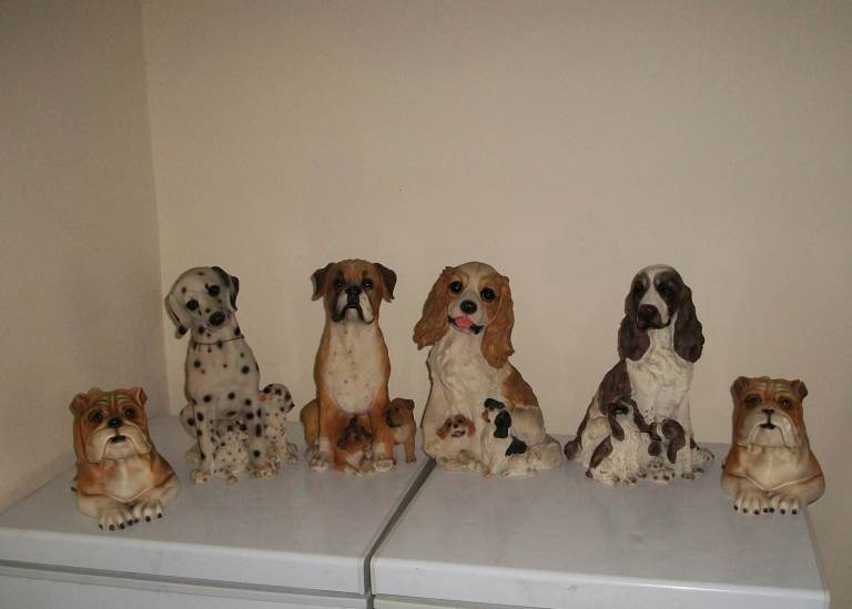 Six large ornamental dogs