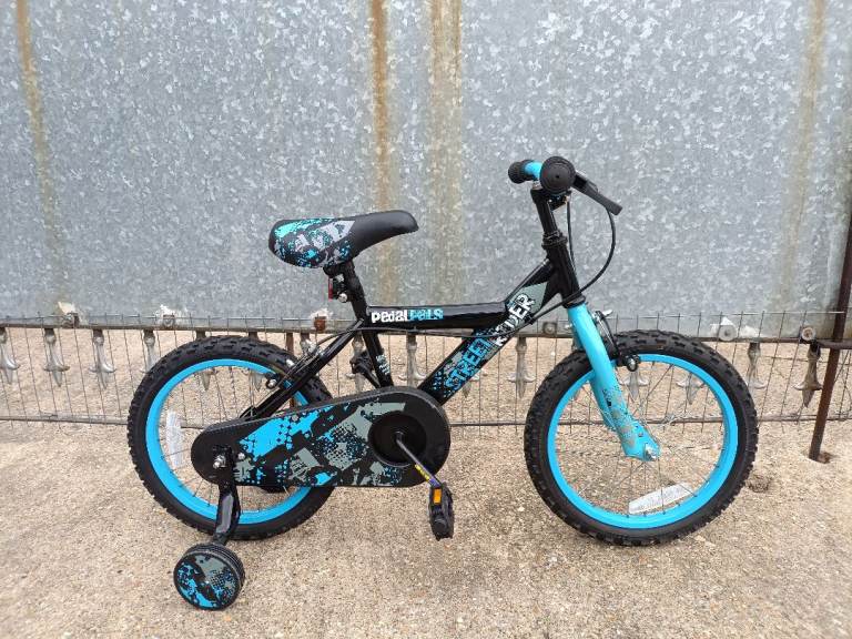 PEDAL PALS (BLUE/BLACK) £40 16 INCH WHELL CHILDS BIKE STABILIZERS,FULL CHAIN GAURD,
