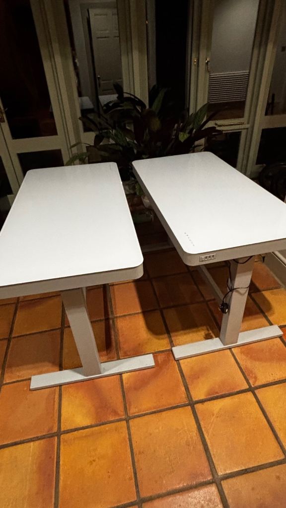 Pair of White Electric Standing Desks with USB Ports