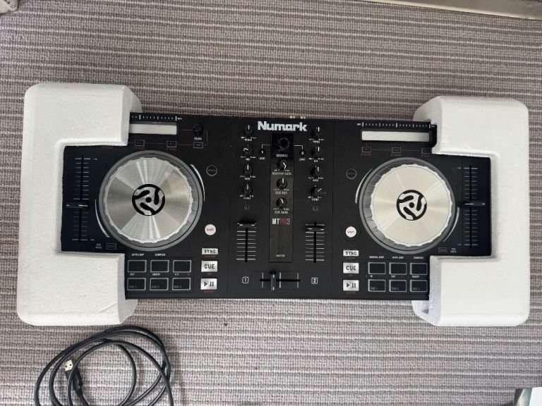 Numark Mixtrack Pro 3 DJ mixer controller with original packaging and headphones