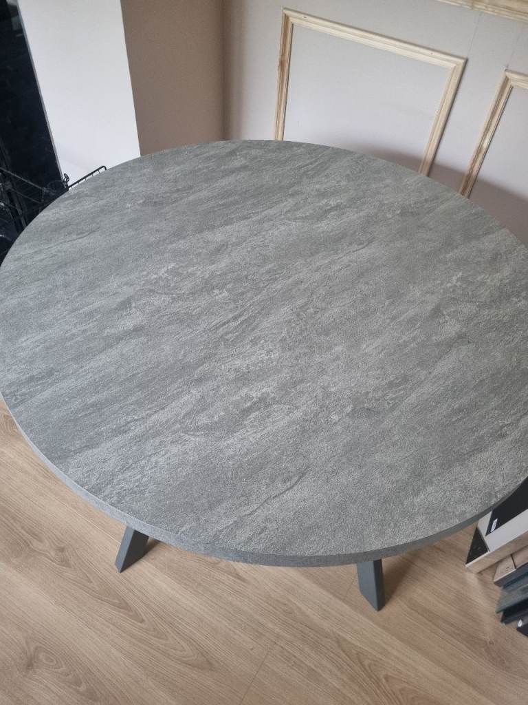 Round grey marble effect melamine dining table with 4 midnight blue coloured wipeable leather chairs