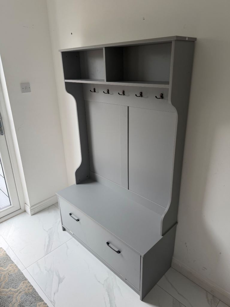 Coat rack stand with seat and shoe storage
