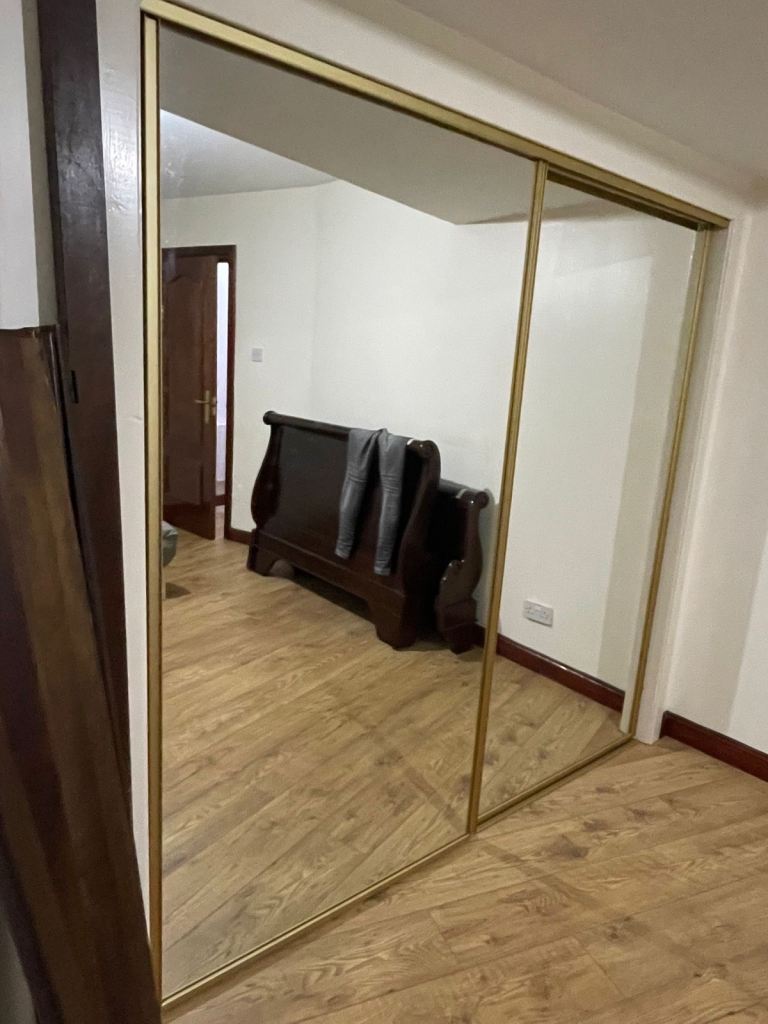 Double mirrored sliding wardrobe doors