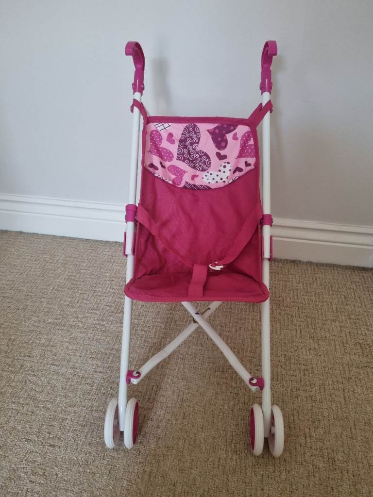 Pink doll's pram