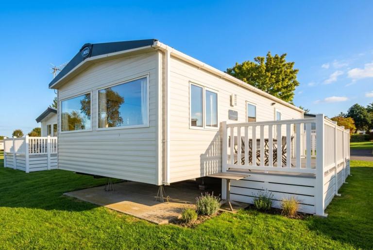 ABI Coworth 2021 static caravan sited at Haven Allhallows, Kent. Decking, 3 bed