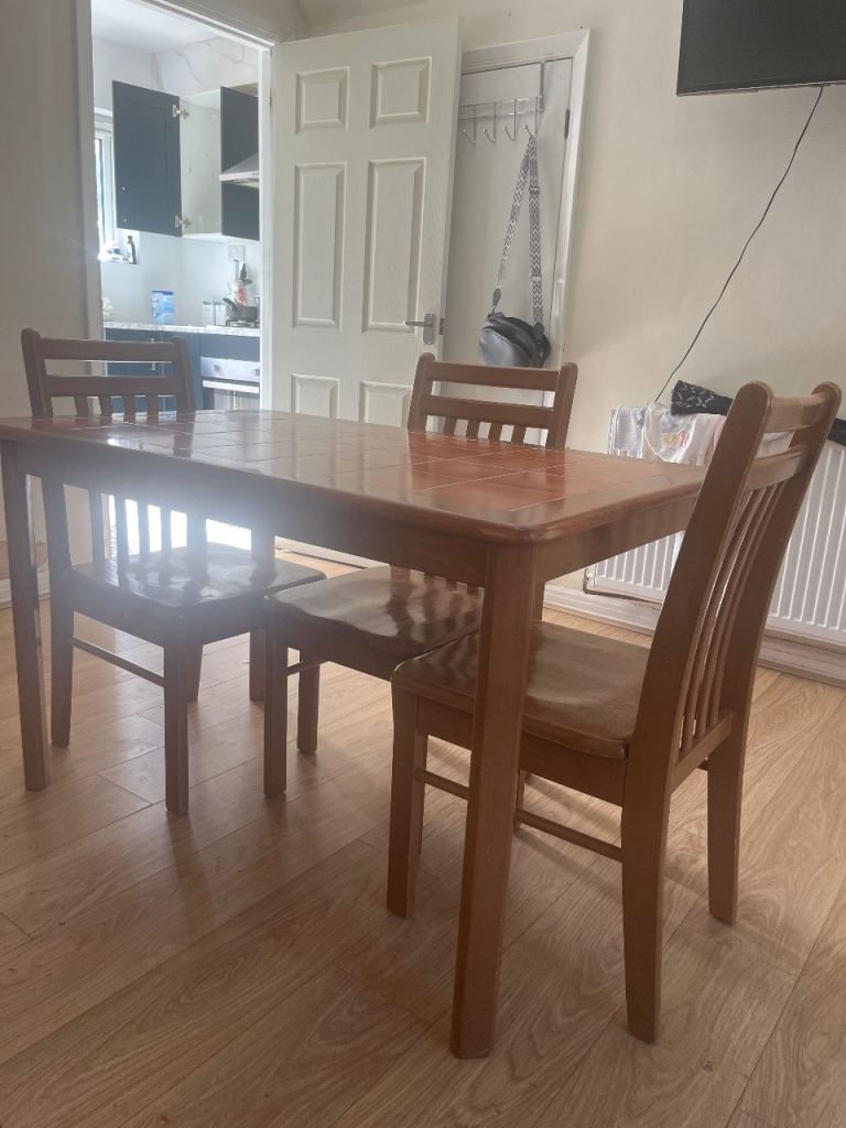 Wooden Dining Table with 4 Chairs – Good Condition