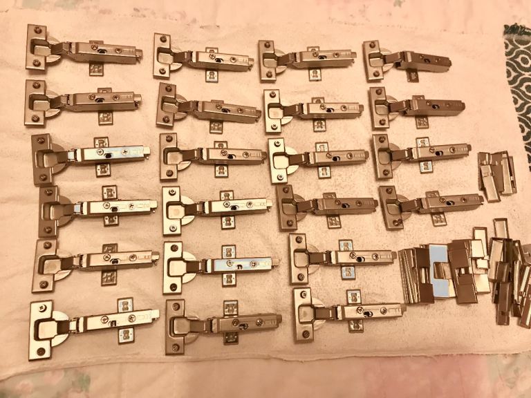 FREE FREE.  22 complete Kitchen Cabinet Door Hinges including screws  - soft close.. As Good As New