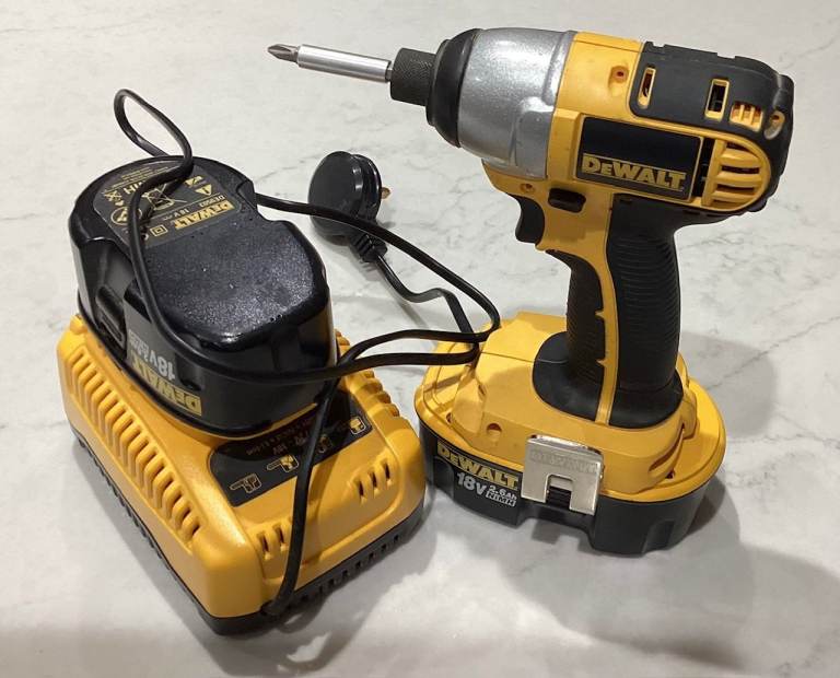 image for DeWALT CORDLESS IMPACT DRIVER MODEL DC825 WITH CHARGER AND 2 x 18V BATTERIES