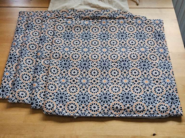 Four brand new garden / outdoor cushion covers £5
