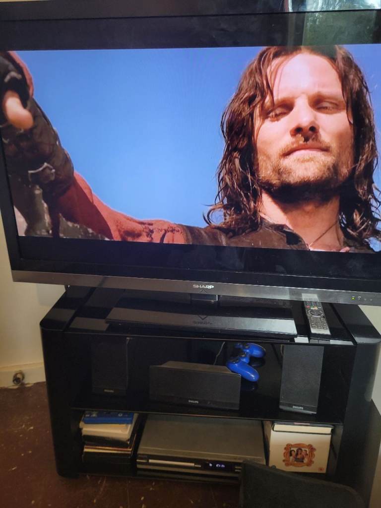 Sharp 46 inch Flat Screen TV with dvd home cinema system and Black TV Unit – Good Condition