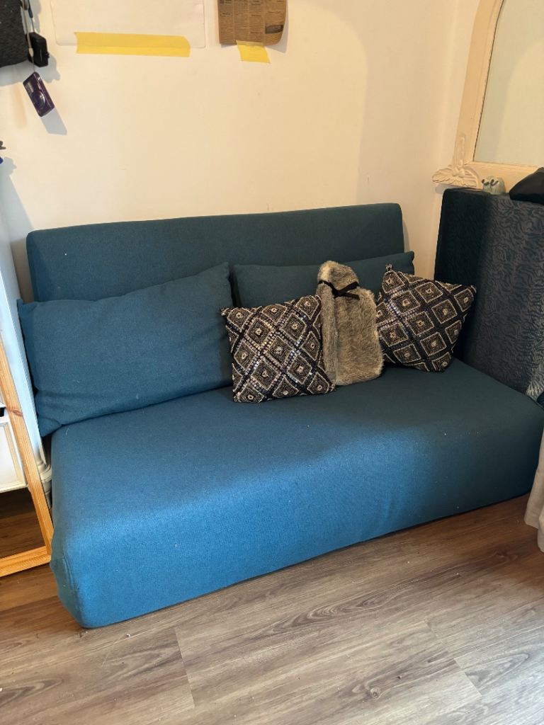 Teal Fabric Sofa Bed with Cushions – Good Condition