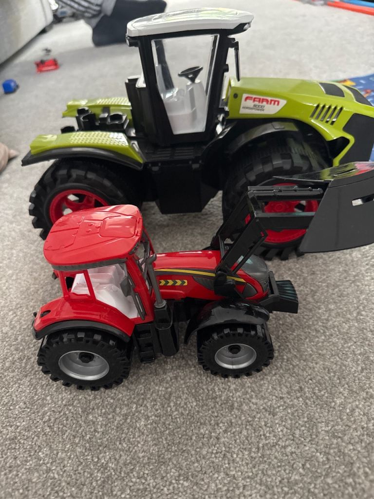 2 toy tractors 